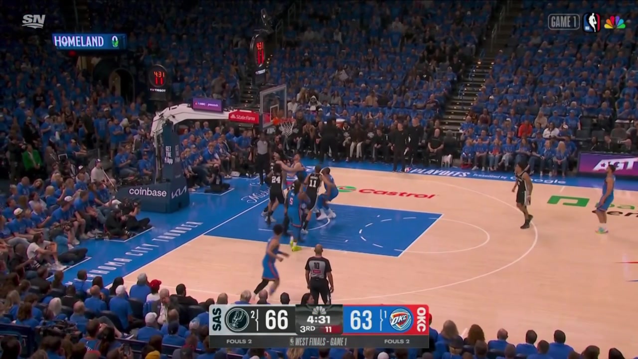 Dylan Harper finishes the easy layup over Ajay Mitchell