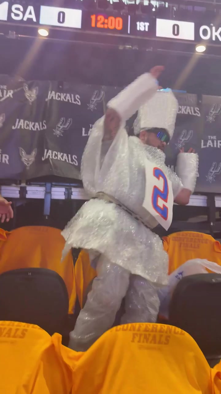 A Spurs fan is dressed up as the SGA bubble wrap for tonight's game