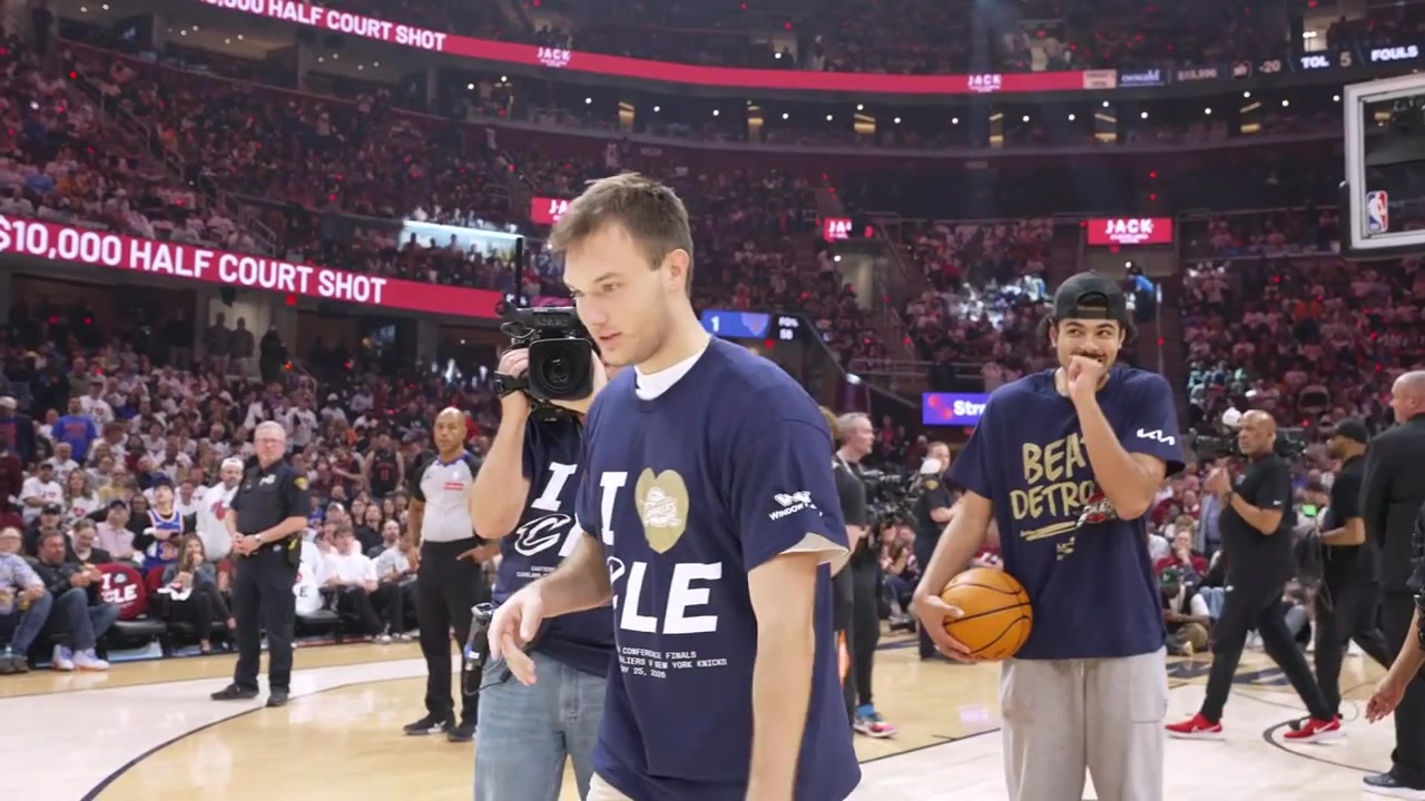 A Cavaliers fan hits a half-court shot for 10000