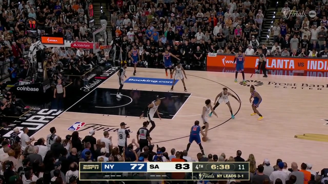 Brunson navigates around Wemby for the bucket and a 4 point game