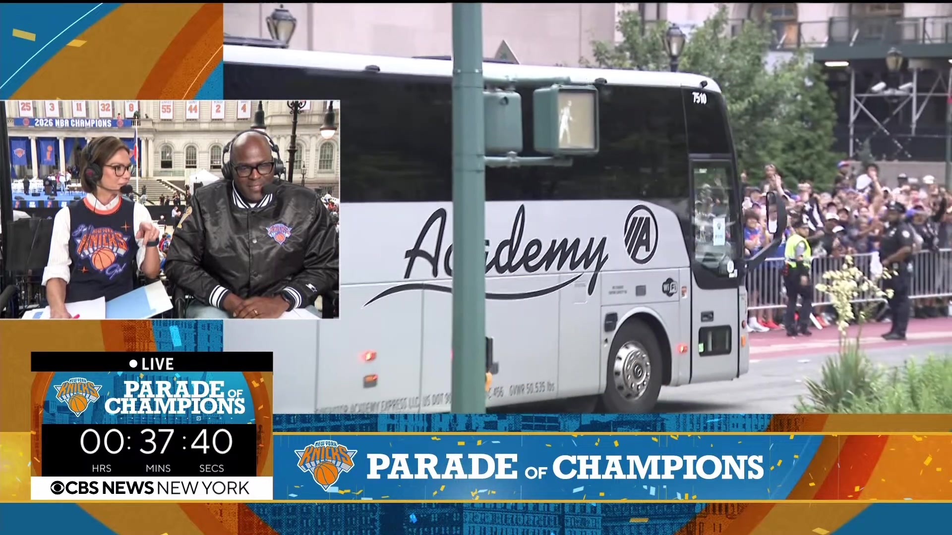The buses arriving for the parade as the fans are waiting for it to start