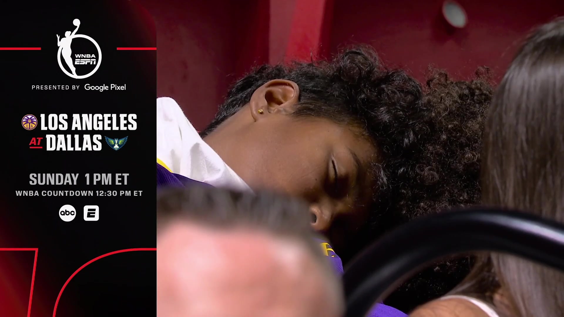 Camerman man focuses on a girl wearing a Lakers' jersey in a deep sleep