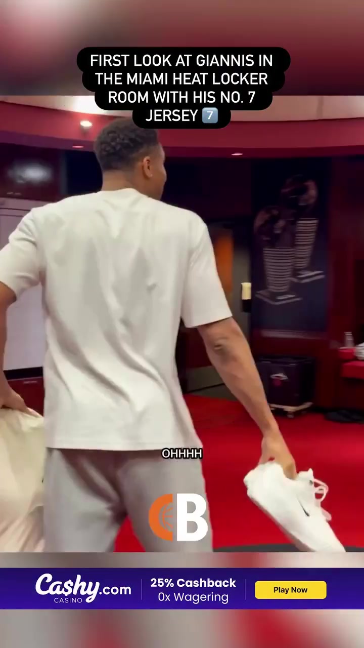 First look At Giannis Antetokounmpo walking into the Miami Heat locker room seeing his No 7 jersey 7