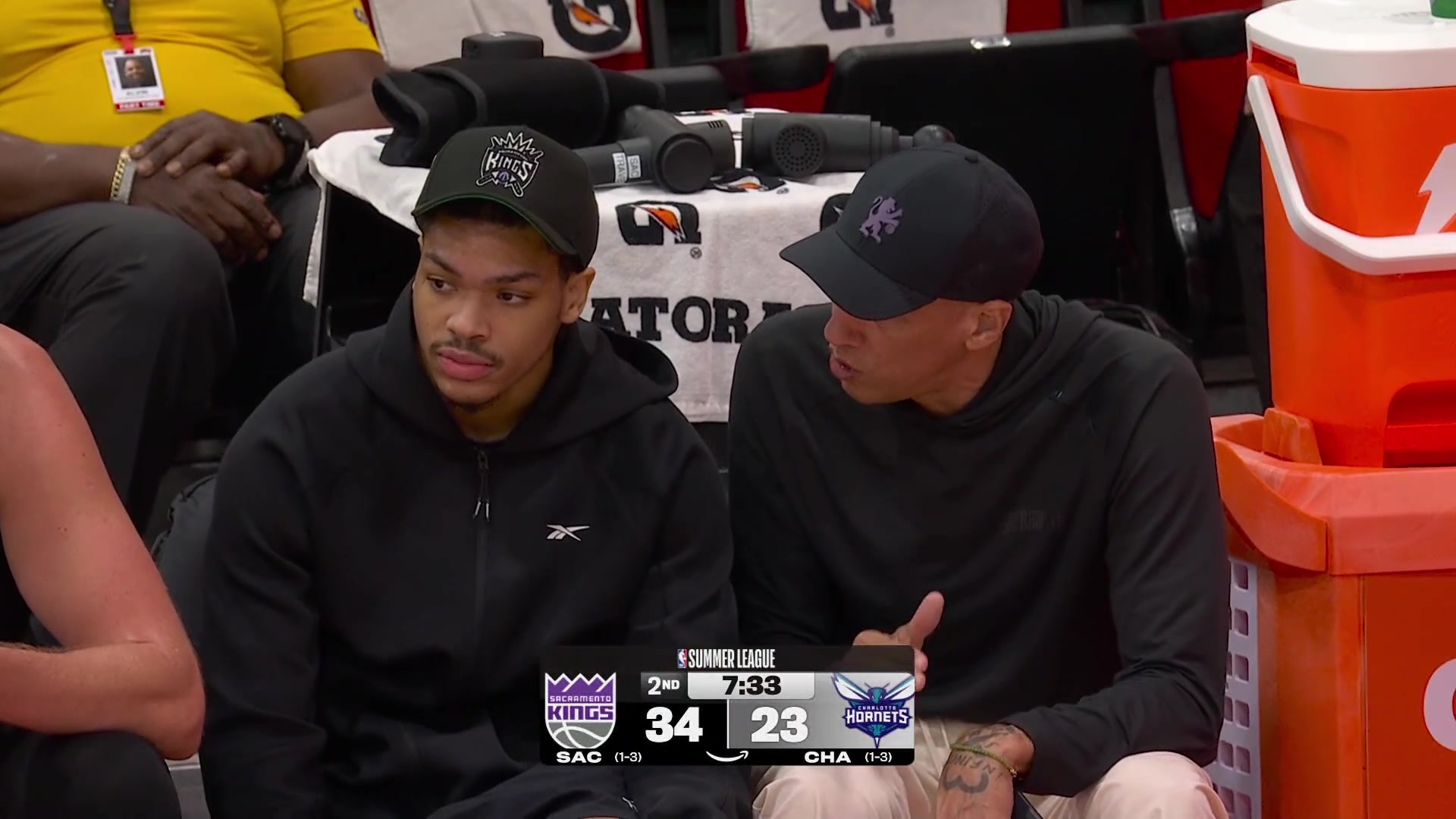 Doug Christie explains things related to basketball to the rookie Darius Acuff Jr from what they've seen so far