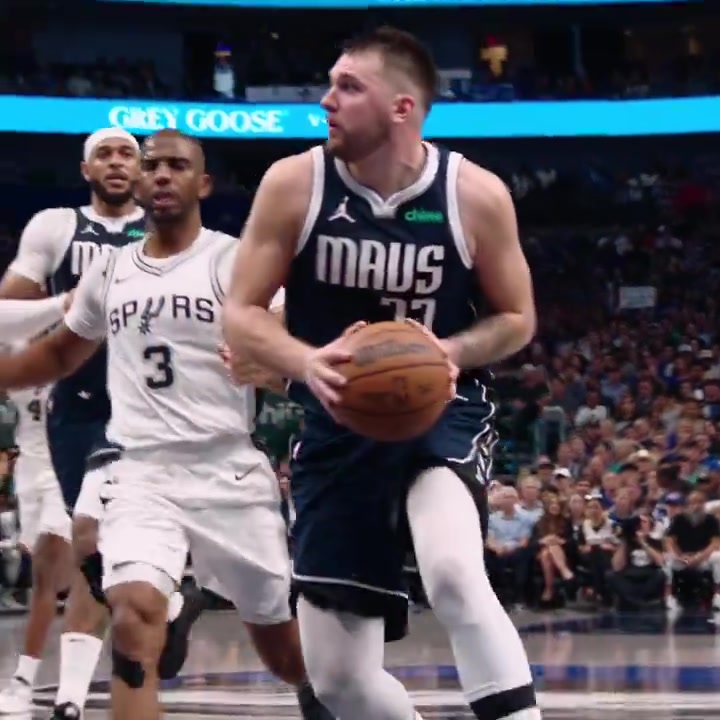 Luka Doncic throws an absurd pass right through the defending arms of Wembanyama