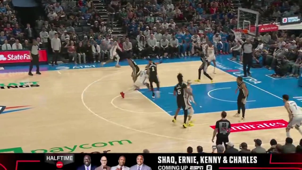 Shai Gilgeous-Alexander with the stiff arm to get free and hit a jumper over Victor Wembanyama