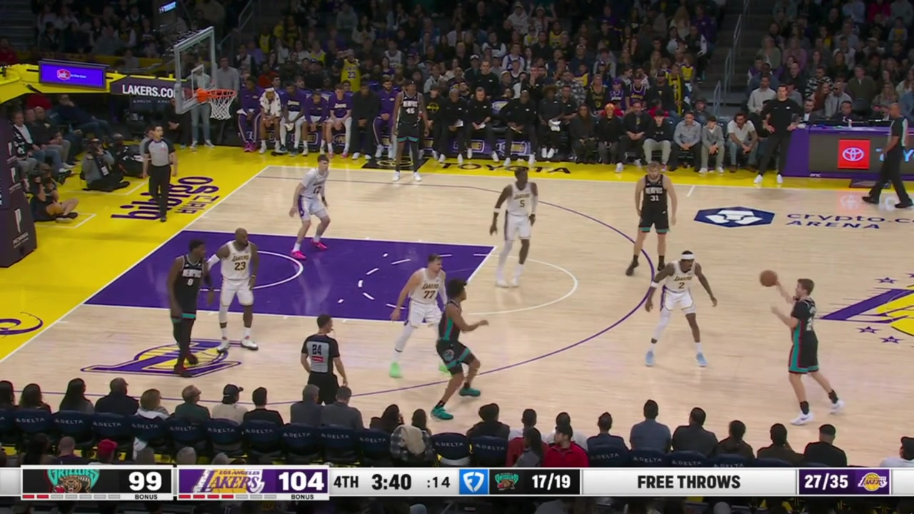 Jaylen Wells goes around Luka Doncic and makes the tough off-balance finish over Deandre Ayton with a replay