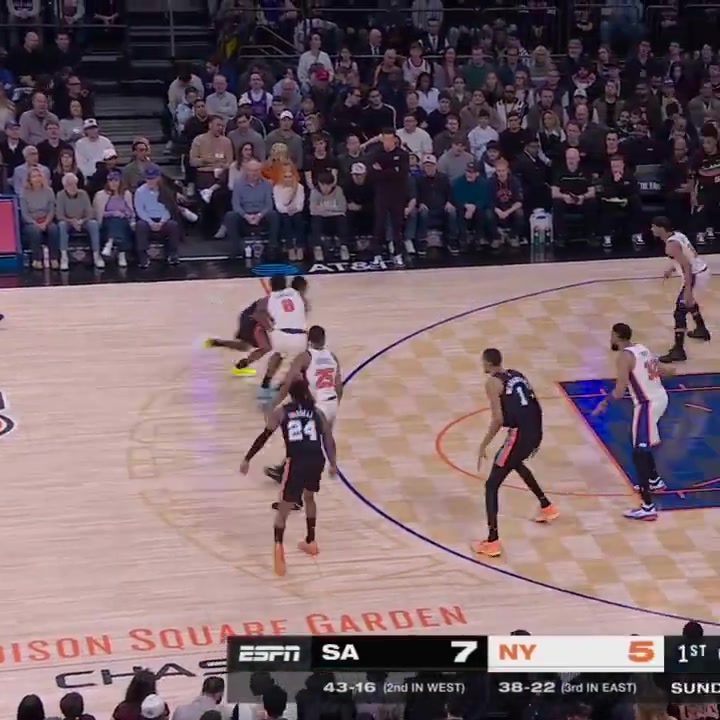 Fox somehow makes the layup despite almost losing the ball and the great Knicks defense