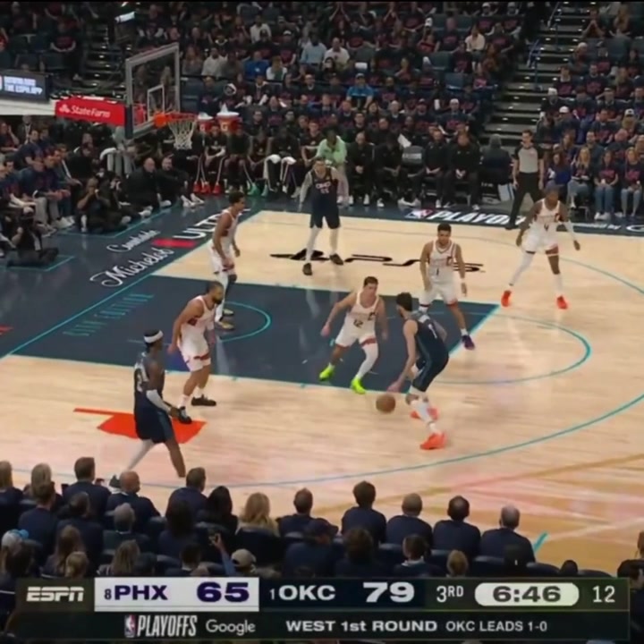 Devin Booker is called for a shooting foul on Chet Holmgren