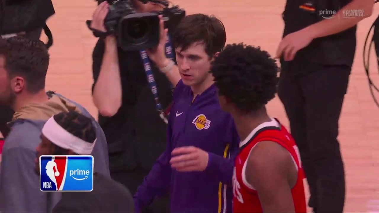 Austin Reaves and Amen Thompson catch up after the game