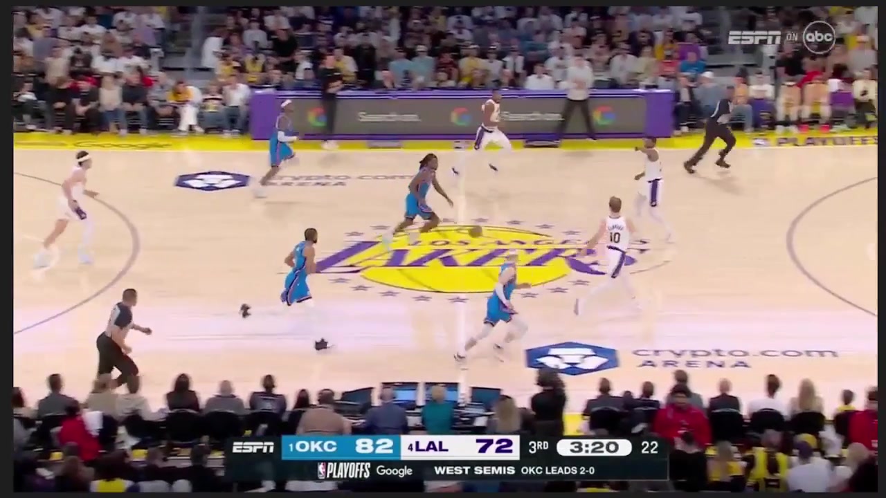 Lakers allow a wide open layup and Doncic bows his head in disappointment