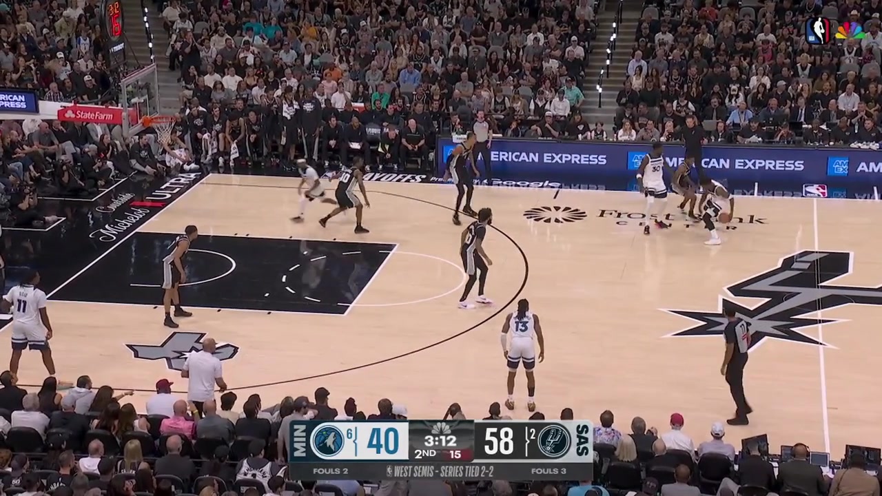 Ayo Dosunmu attacks the basket and manages to dunk before Wemby gets to him with a replay