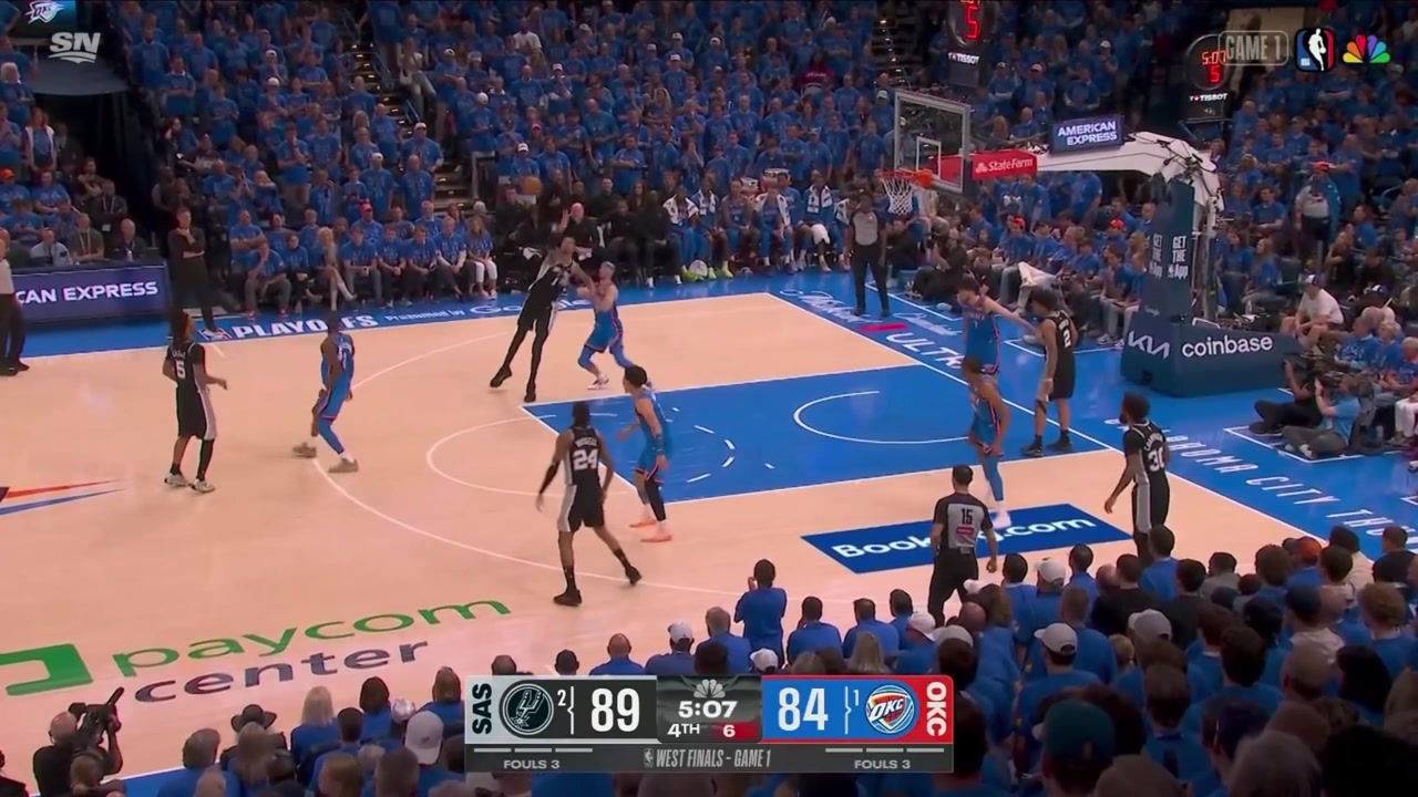Dylan Harper gets the layup to go over Chet Holmgren's defense