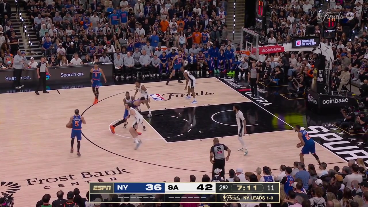 Karl-Anthony Towns manages to grab the pass under the rim and while surrounded by four Spurs players he finds Mikal Bridges for the corner 3 with a replay