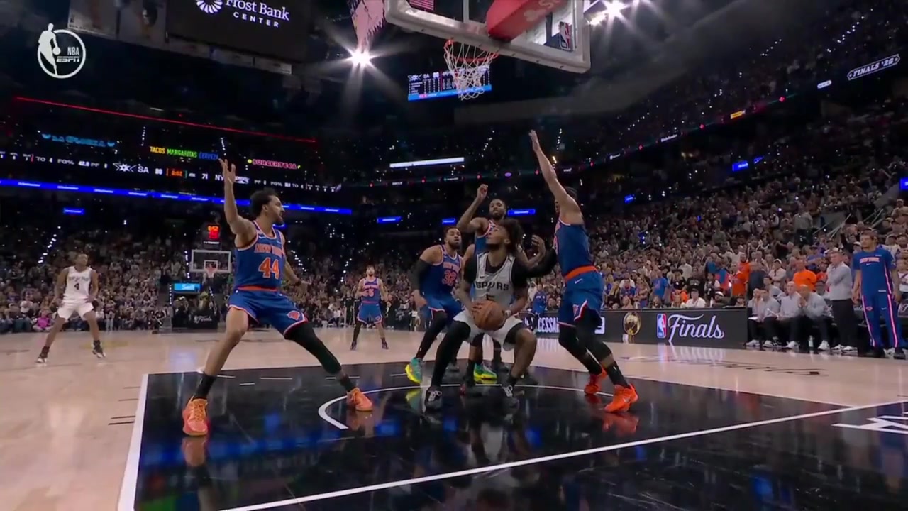 Josh Hart grazes the ball before fouling Stephon Castle