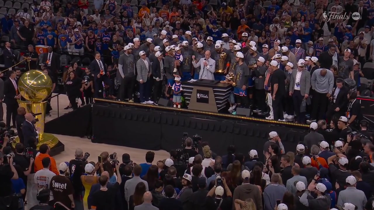 The final moments of the 2026 NBA Championship ceremony as the New York Knicks take a team photo with the Larry O'Brien Championship Trophy