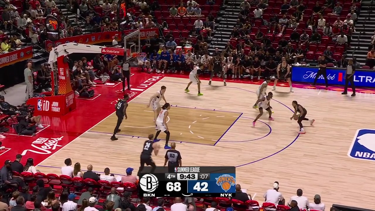 Danny Wolf swishes the turnaround 3-pointer sort of hook shot to beat the shot clock