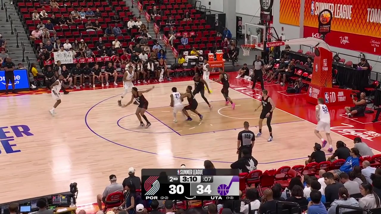 Orlando Robinson hustles for the loose ball and KO a chair as a fan moves a seat right on time to avoid being KOed as well with a replayDarryn Peterson and his teammates on the bench laugh at it