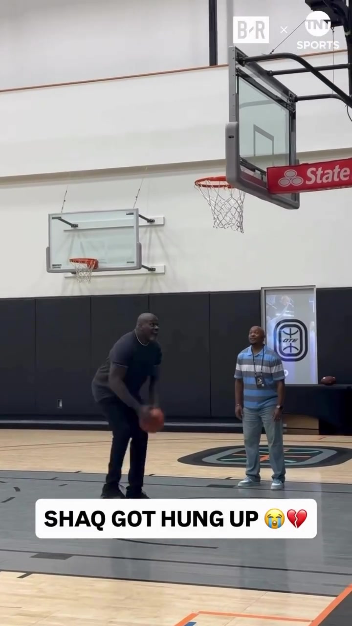 Shaq getting stuffed by the rim after attempting to dunk for the first time in a while