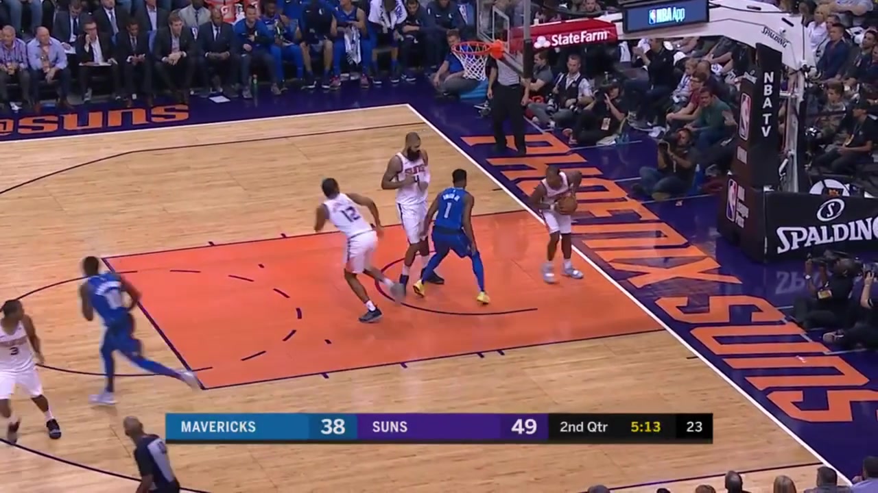 The rookie Jalen Brunson draws his first-ever charging foul The victim is TJ Warren with replaysMavericks and Suns commentaryPhoenix Suns vs Dallas Mavericks - 101718
