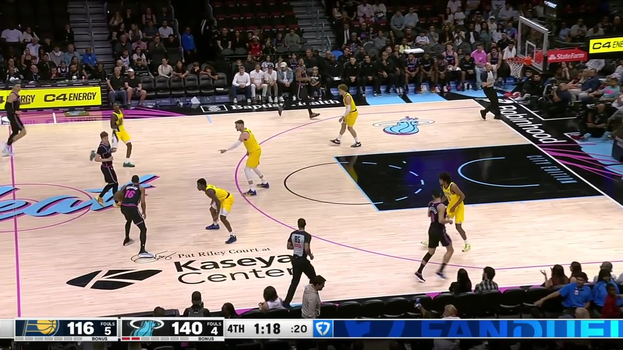Keshad Johnson stretches his arms way outward and then finishes with the nasty reverse putback dunk with replays