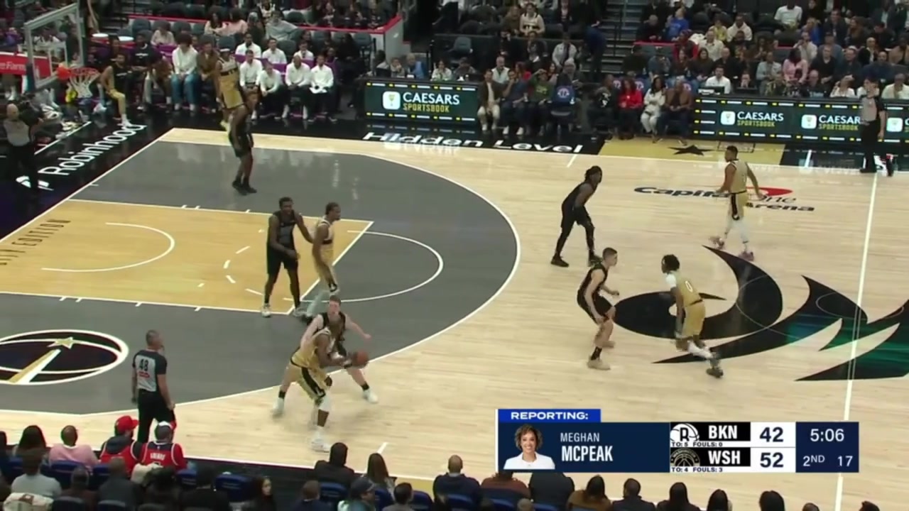 Sarr almost loses the ball but keeps the handle and drives through the defense for the two handed slam