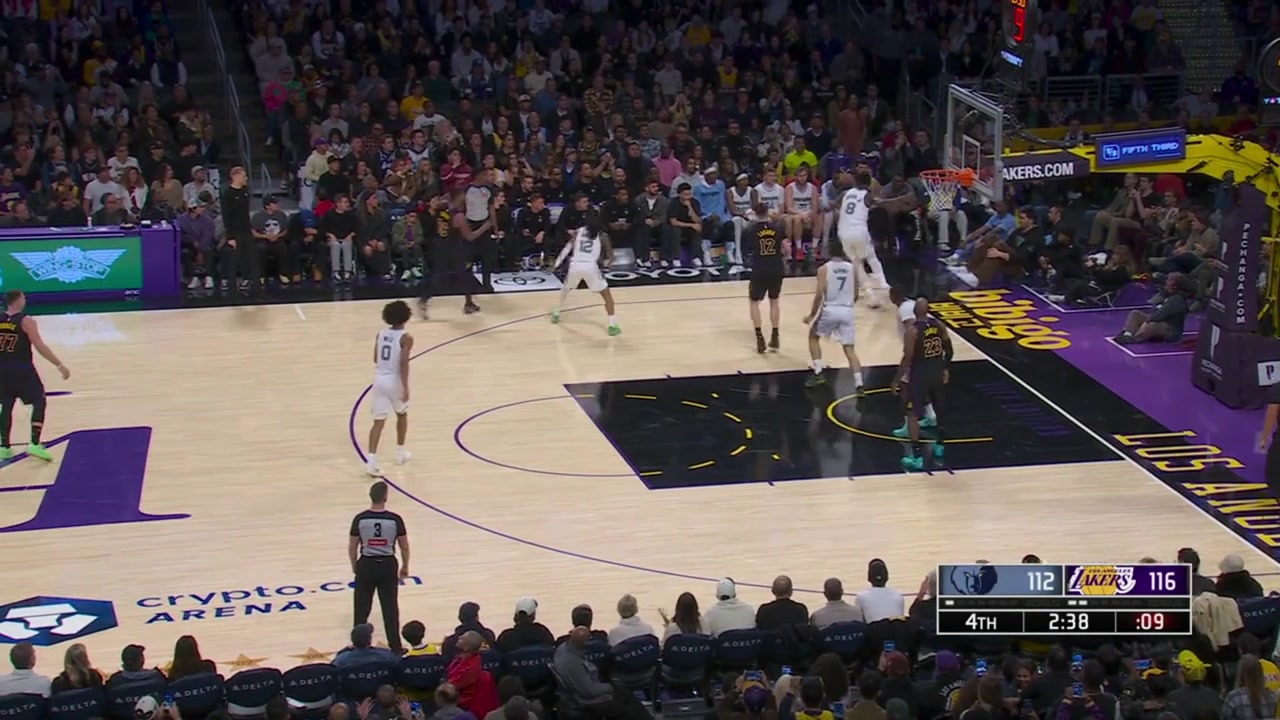 Luka kicks it out to LaRavia for the 3 after a chaotic possession