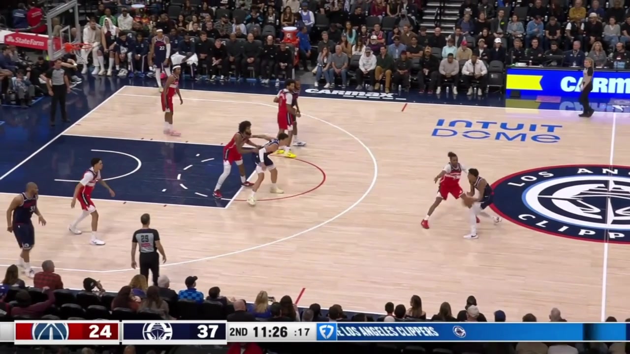 Niederhauser with the alley oop dunk over Marvin Bagley III