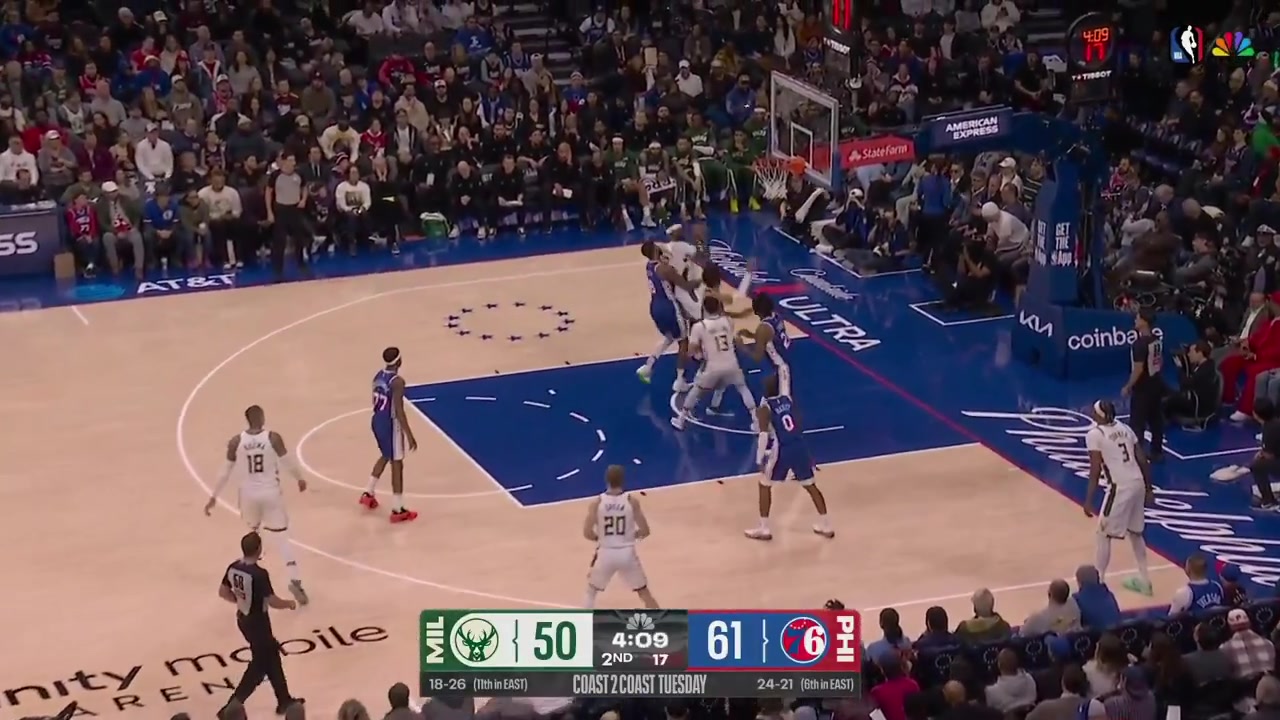 Joel Embiid with the monster alley-oop dunk in transition with replays Embiid cannot believe it and Maxey is hyped