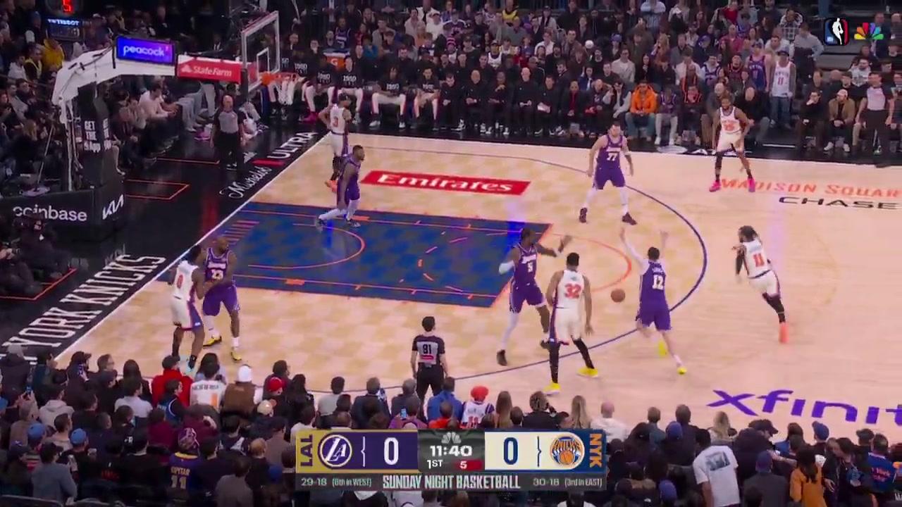 LeBron James launches a touchdown pass to Luka Doni for the transition layup scoring the Lakers' first points against the Knicks