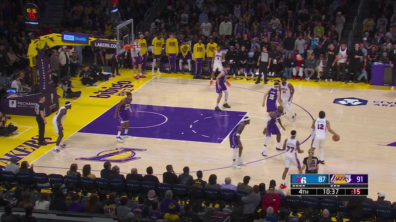 Reaves plays perfect defense to avoid Embiid's rip-through attempts and forces a turnover