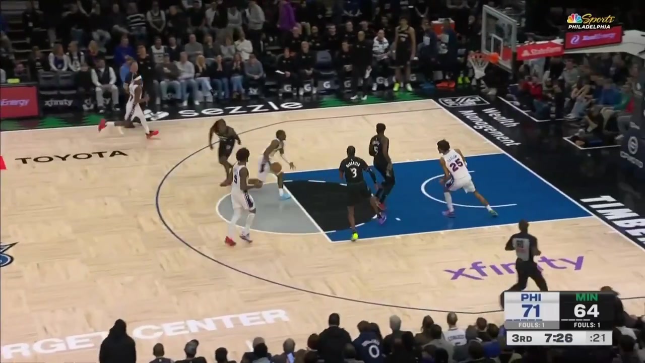 Tyrese Maxey with the poster on Anthony Edwards