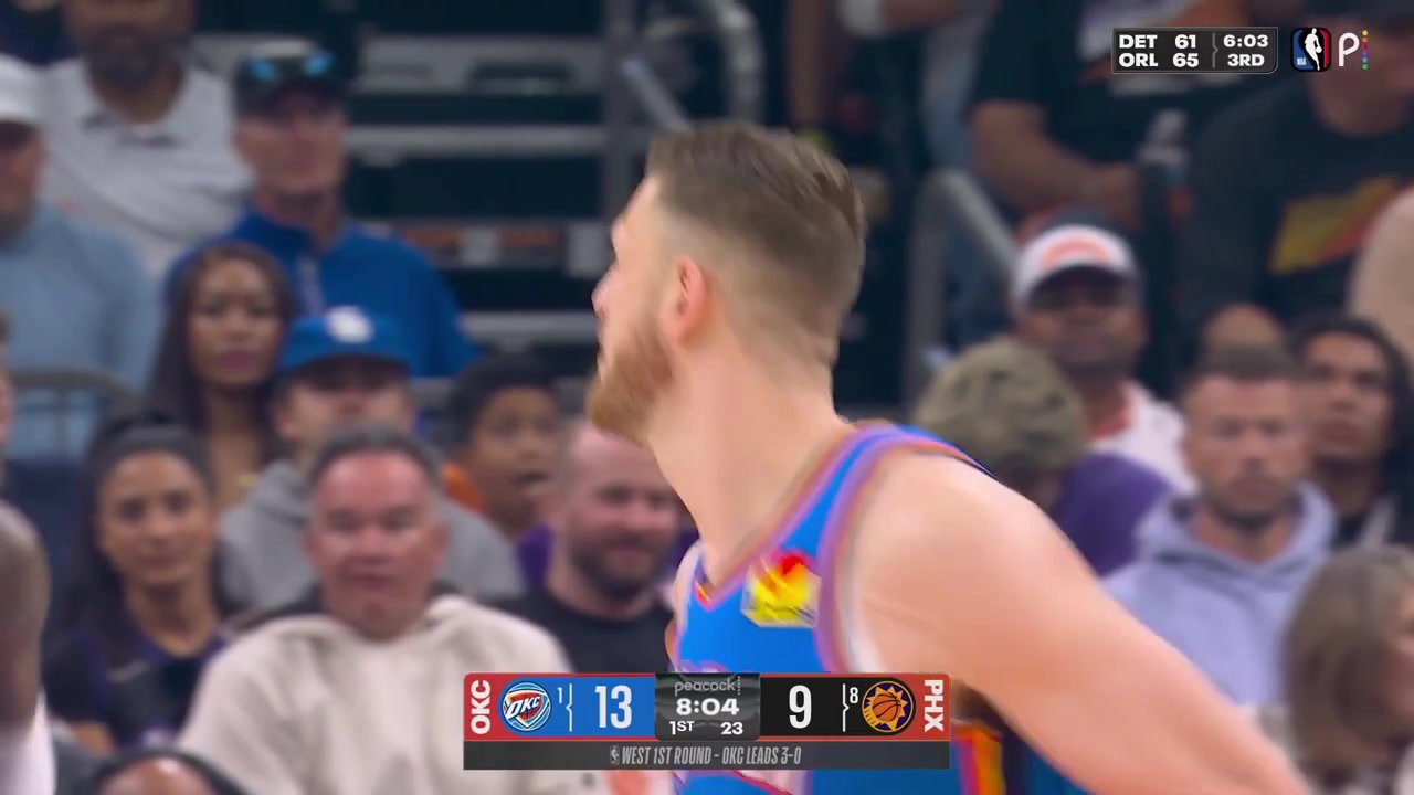 Devin Booker gets fouled by Lu Dort on the shot attempt