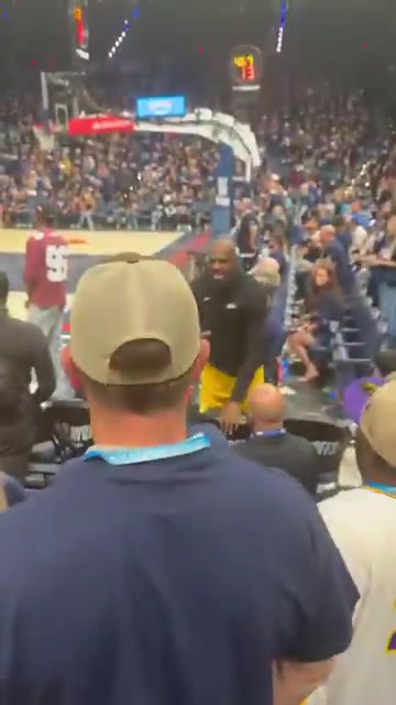 LeBron James having words with a fan during the game