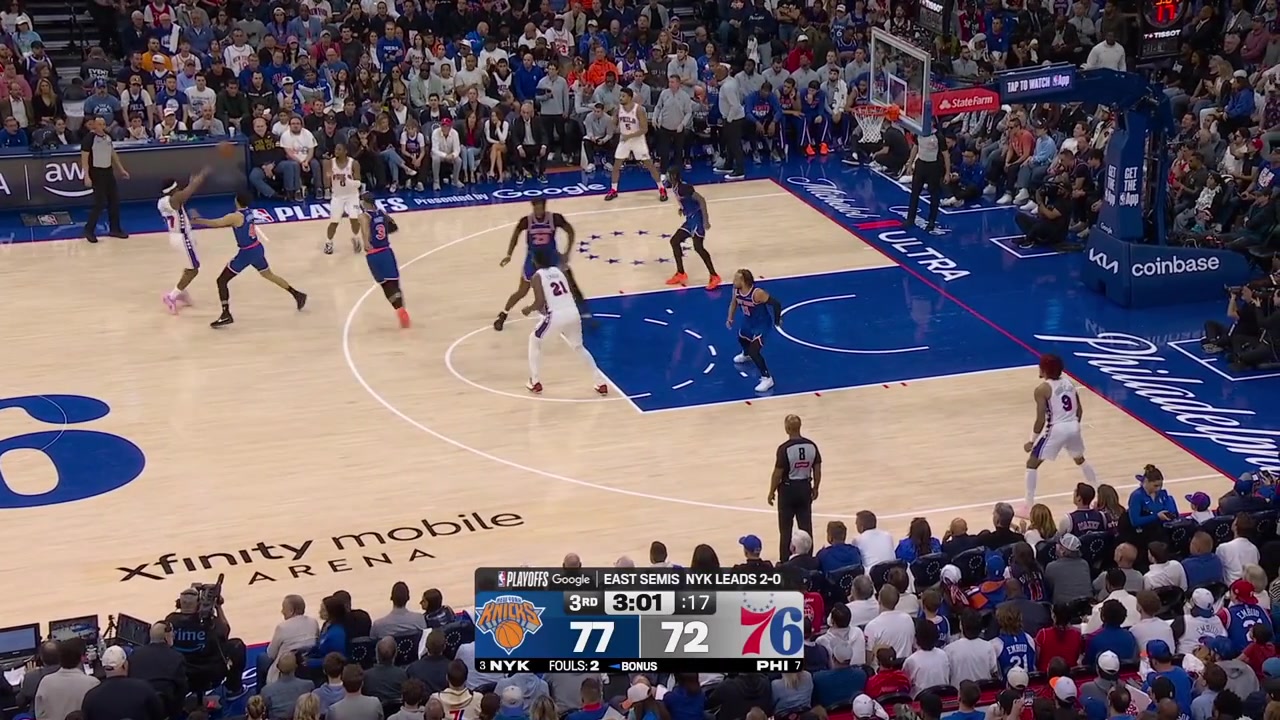 Josh Hart fouls Joel Embiid who falls on the floor and walks slowly once he is helped to get up walking a bit gingerly with a replay