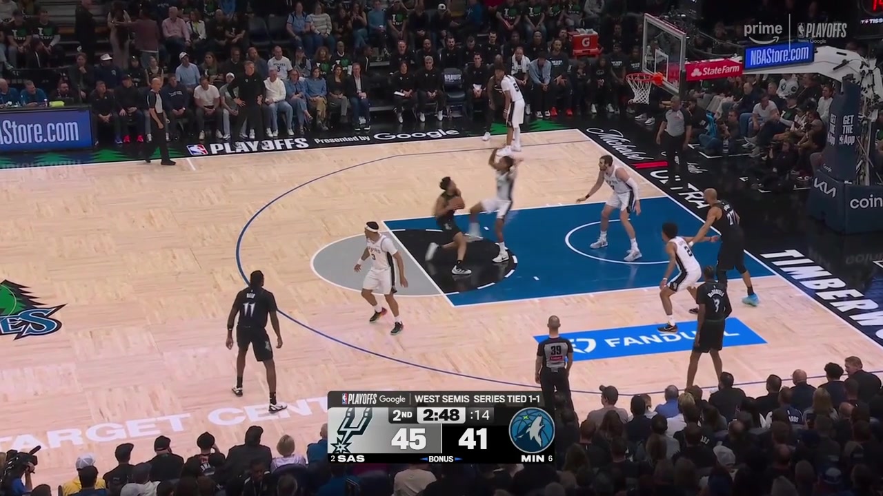 Rudy Gobert hammers the one handed tip-in dunk