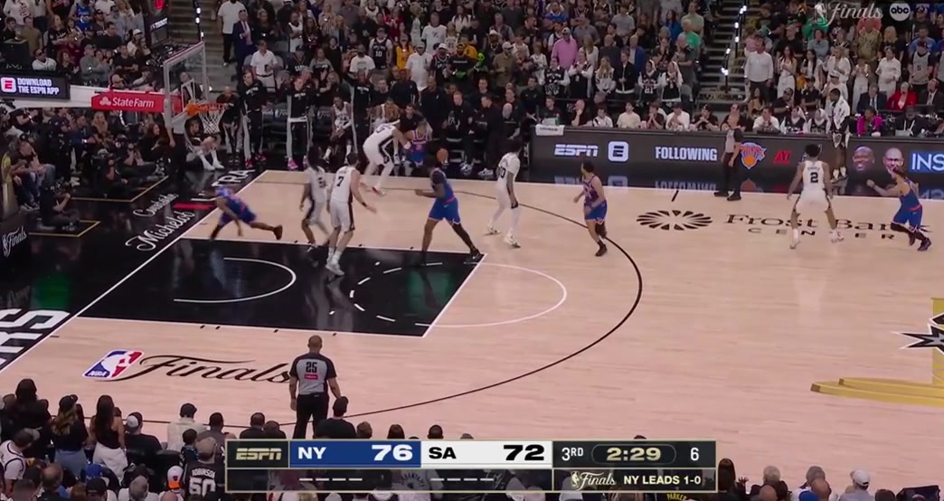 Miles McBride creates space and sinks the tough gorgeous-looking deuce over Keldon Johnson