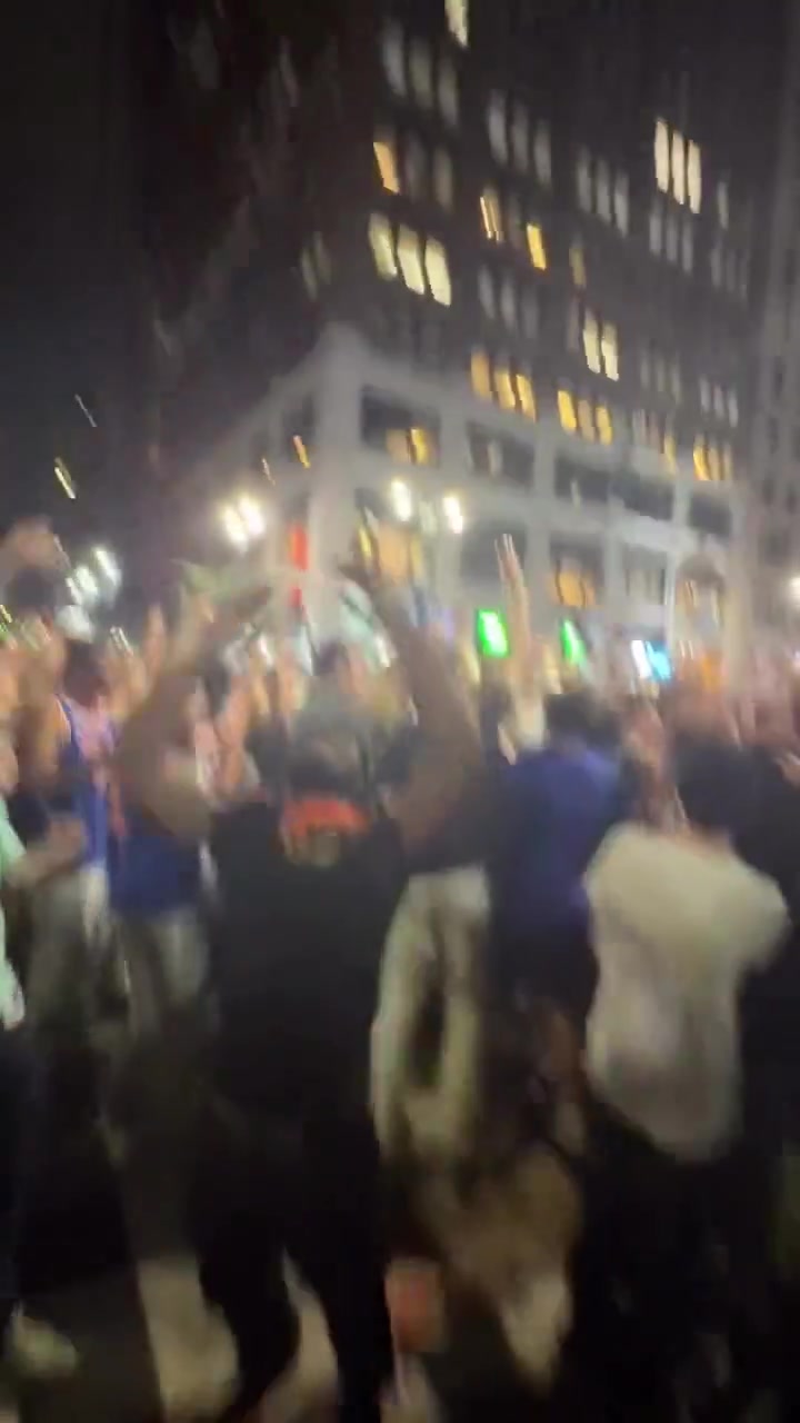 A Knicks fan hits a perfect granny shot while celebrating