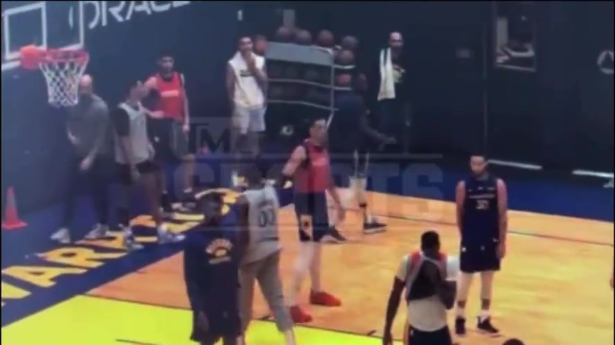 Draymond Green punches Jordan Poole in the face