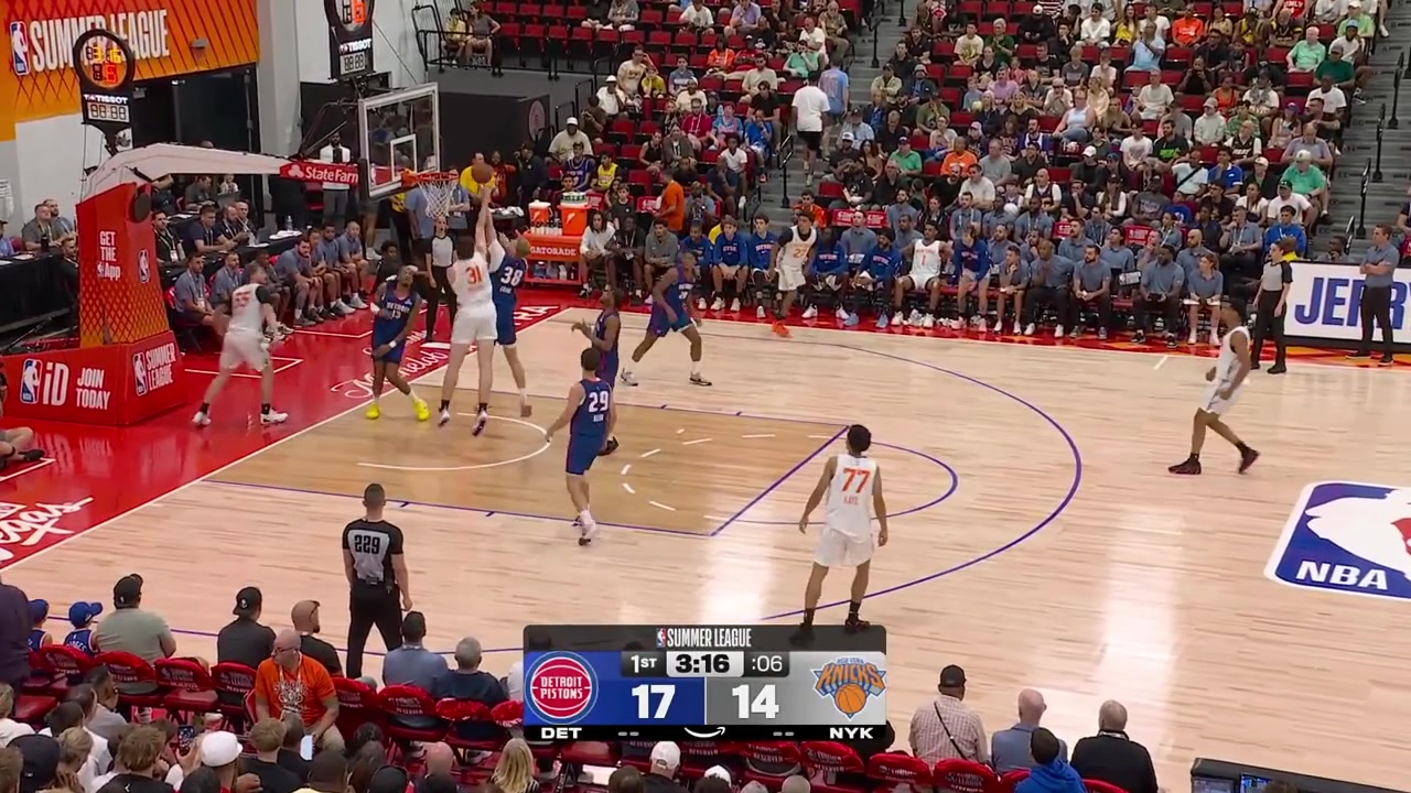 Ebuka Okorie with the driving layup over Nick Jourdain with a replay