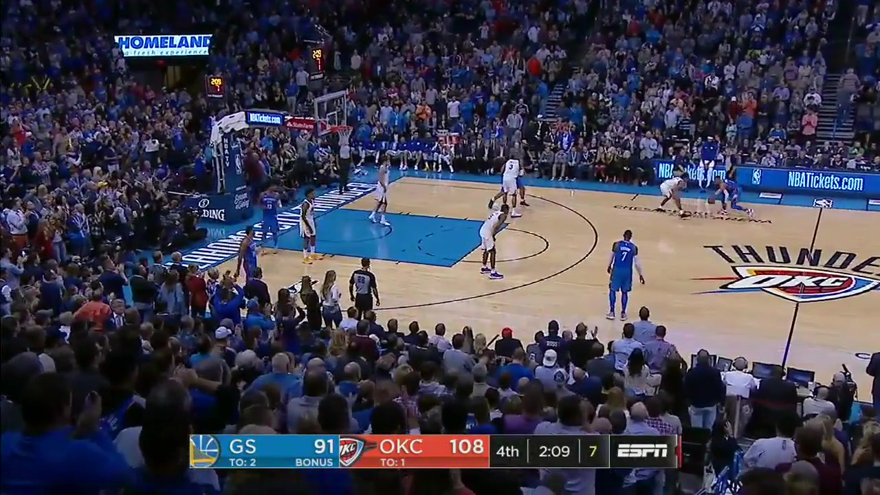 Stephen Curry and Kevin Durant on the bench laughing at Russel Westbrook's failed attempt to get a triple double